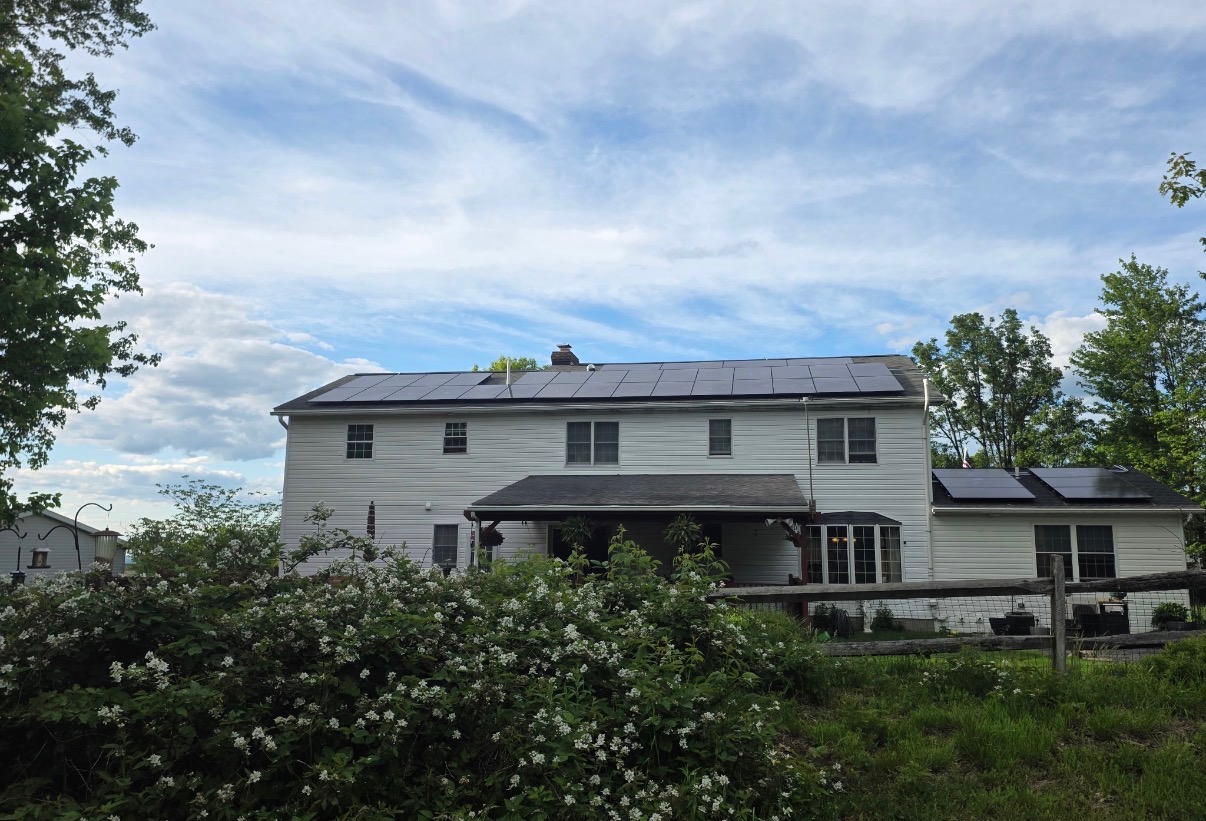 Solar across the main roof and addition of a two-story home.